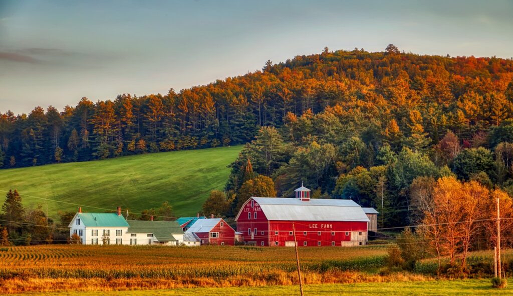 New Hampshire farm land with fall foliage.