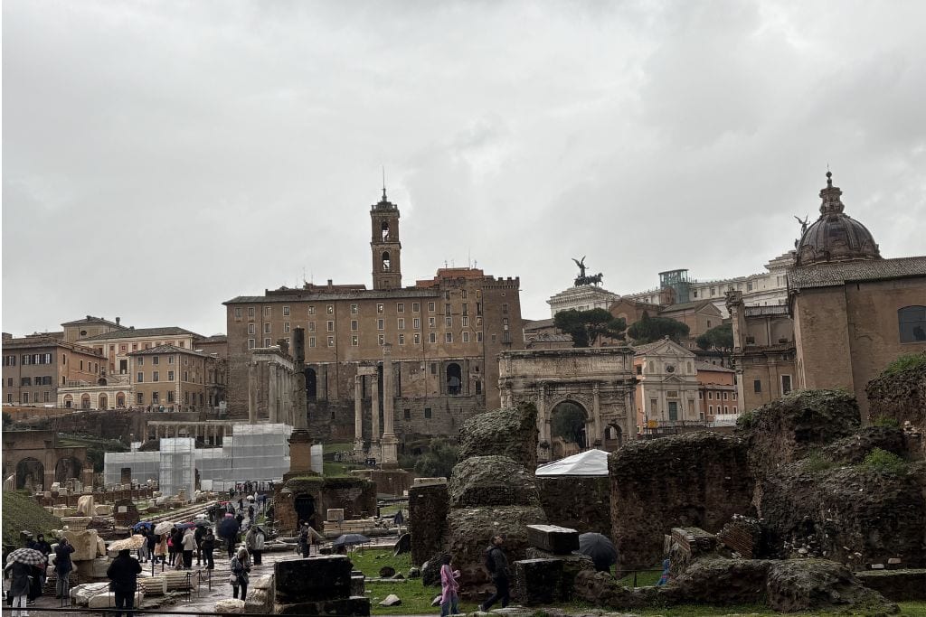 A wide view of ancient ruins and Roman buildings