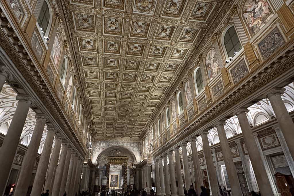Inside of basilica with vaulted ceiling and pillars