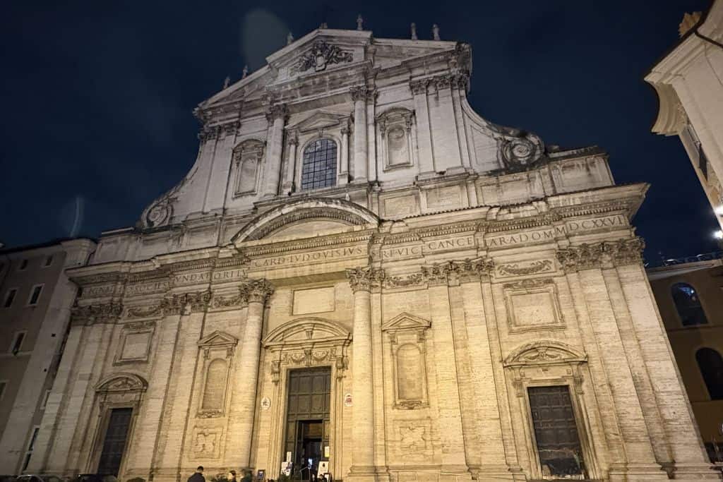 Outside of church facade at night in baroque style